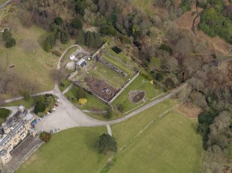 Oblique aerial view centred on the walled garden, taken from the SW.