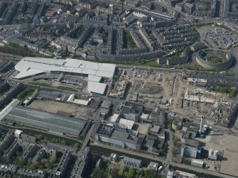 Oblique aerial view centred on the former Fountain Brewery site with the Leisure Centre adjacent, taken from the SE.