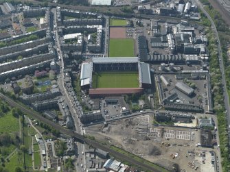 Oblique aerial view centred onTynecastle Park, Heart of Midlothian Football clubs stadium, with the distillery adjacent, taken from the East North-East.
