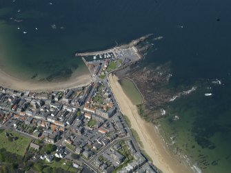 General oblique aerial view centred on the N part of the town, taken from the SE.