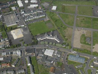 Oblique aerial view centred on St Francis' School, taken from the S.