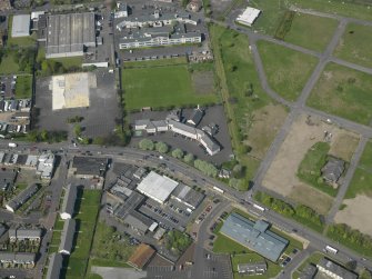 Oblique aerial view centred on St Francis' School, taken from the SSE.