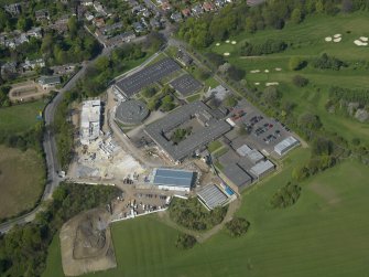 Oblique aerial view centred on the school, taken from the SSW.