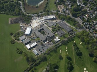 Oblique aerial view centred on the school, taken from the E.