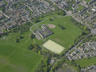 Oblique aerial view centred on the Sports Centre, taken from the SE.