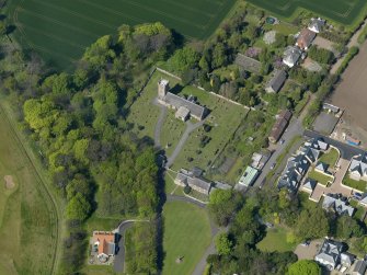 Oblique aerial view centred on the parish church with the church hall adjacent, taken from the SSE.