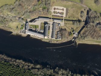 Oblique aerial view centred on the former mill following redevelopment into a visitor centre and flats, taken from the S.
