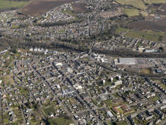 General oblique aerial view of the town with Rattray beyond, taken from the SW.