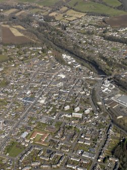 General oblique aerial view of the town with Rattray beyond, taken from the SSW.