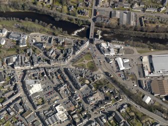 Oblique aerial view of the town centred on the bridge, taken from the WSW.