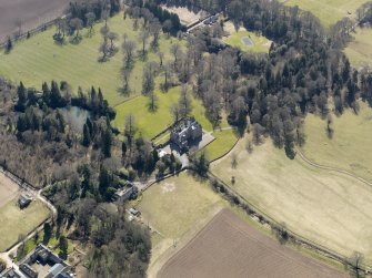 Oblique aerial view centred on the country house, taken from the N.