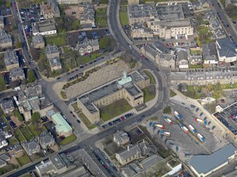 Oblique aerial view centred on the town hall, taken from the SE.