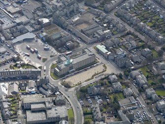 Oblique aerial view centred on the town hall, taken from the NW.