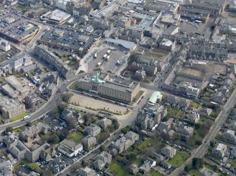 Oblique aerial view centred on the town hall, taken from the WSW.