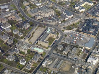 Oblique aerial view centred on the town hall, taken from the SE.