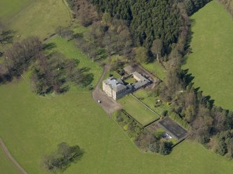 Oblique aerial view of the house with the office court adjacent, taken from the SE.