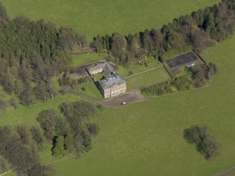 Oblique aerial view of the house with the office court adjacent, taken from the SW.