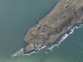 Oblique aerial view centred on S defences, taken from the SE.