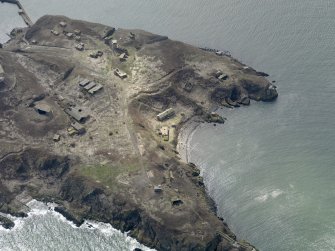 Oblique aerial view centred on part of the northern defences, taken from the NE.