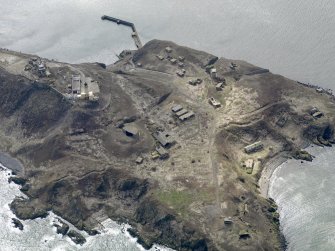 Oblique aerial view centred on the northern defences, taken from the NE.