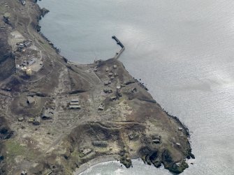 Oblique aerial view centred on the northern defences, taken from the N.