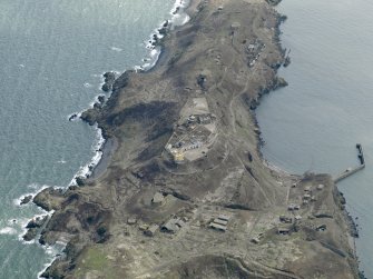 Oblique aerial view centred on the northern defences, taken from the N.