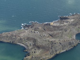 Oblique aerial view centred on the northern defences, taken from the NW.