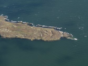 Oblique aerial view centred on S defences, taken from the SW.