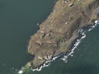 Oblique aerial view centred on S defences, taken from the SE.