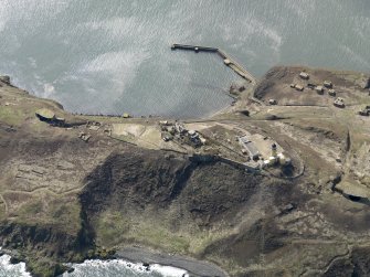 Oblique aerial view centred on the central defences, taken from the ENE.