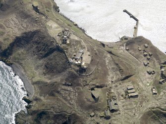 Oblique aerial view centred on the central defences, taken from the E.