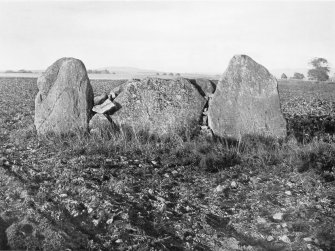 Photograph of recumbent stone circle at South Ley Lodge, taken from SW.
Titled: "South Ley Lodge. Recumbent Stone and Flankers".