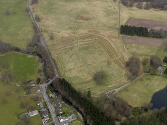Oblique aerial view centred on the bunkers and trenches, taken from the S.
