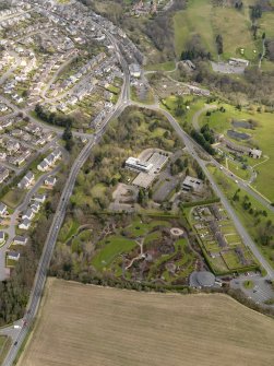 Oblique aerial view centred on the Distillers Head Office with the gardens adjacent, taken from the WSW.