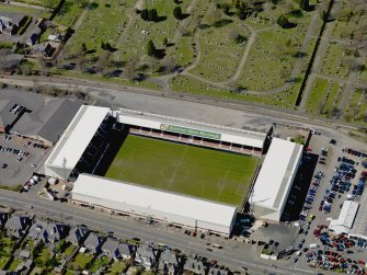 Oblique aerial view centred on the football ground taken from the S.