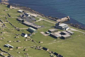 Village Bay, Ministry of Defence Establishment. General elevated view from N, including the Factor's House, church and manse, the Feather Store and quay.