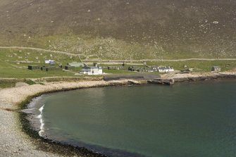 Village Bay, Ministry of Defence Establishment. General view from SW, including the Factor's House, quay, church and Feather Store.