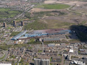 Oblique aerial view centred on the steel works, taken from the SW.