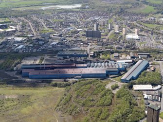 Oblique aerial view centred on the steel works, taken from the NNE.