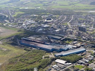 Oblique aerial view centred on the steel works, taken from the N.