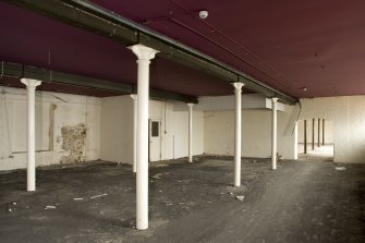 Interior. Second floor.  General view from north, Section E. Note slender cast-iron columns.