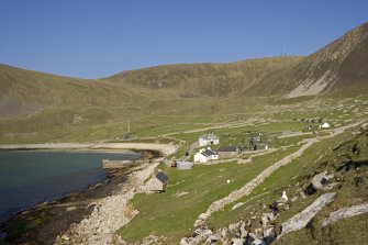 Village Bay, Ministry of Defence Establishment. General view from E, including the gun emplacement, Feather Store, church and manse.