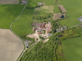 Oblique aerial view centred on the brickworks, taken from the ENE.