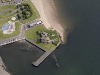 Oblique aerial view centred on the castle, taken from the SW.