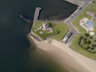 Oblique aerial view centred on the castle, taken from the ESE.