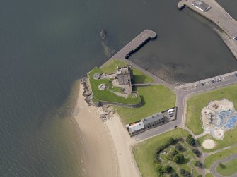 Oblique aerial view centred on the castle, taken from the ENE.