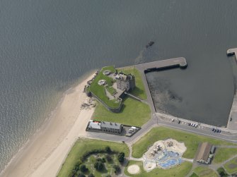 Oblique aerial view centred on the castle, taken from the NE.