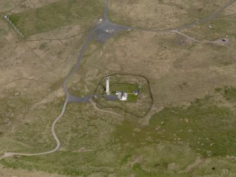 Oblique aerial view centred on the lighthouses, taken from the SSW.