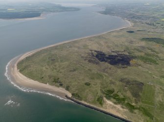 General oblique aerial view centred on the Links with the firing range adjacent, taken from the ESE.