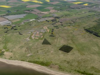 General oblique aerial view centred on the camp and training area, taken from the E.